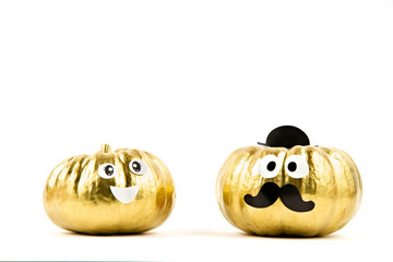 Funny pumpkins with googly eyes over the white background. Funny party invitation; halloween celebration concept
