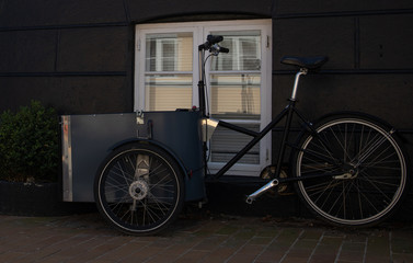 rickshaw bike parked in front of the house,Svaneke,Bornholm