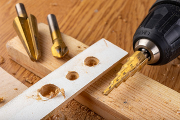 Taper drill and countersink for workshop salts. Accessories and tools in the workshop.