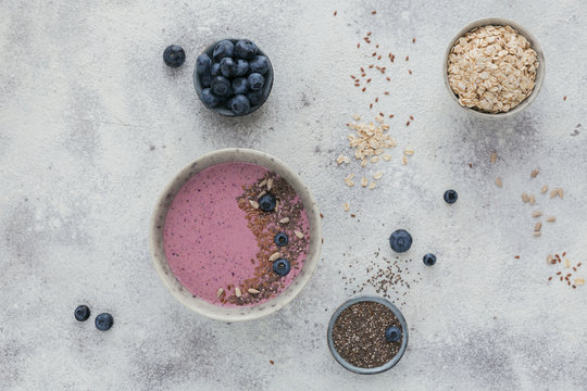 Ingredients For Making Pink Yogurt Smoothie Bowl With Blueberry And Seeds