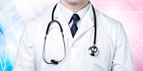 Male doctor with stethoscope on blurred hospital background