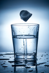 splashing clean water in a glass