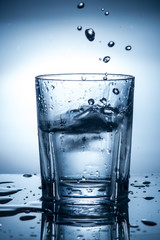 splashing clean water in a glass