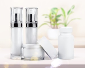 Set of cosmetic products in white containers
