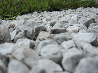 White stones with green grass