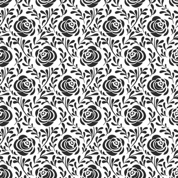 Black roses silhouettes and leaves on white background. Seamless pattern. Alice in Wonderland background for fabric, wrapping, wallpaper. Decorative print. Vector illustration