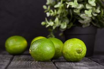 lime juice with lime slices on wooden table. Detox diet