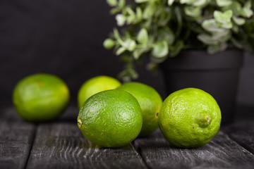 lime juice with lime slices on wooden table. Detox diet