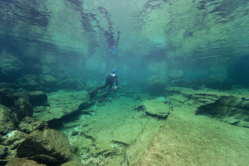 Rocks underwater on riverbed with clear freshwater. Underwater landscape. Traun river. Freshwater...