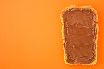 chocolate butter sandwich (delicious snack, bread or toast and nut butter, paste, classic combination of taste, Italian cuisine) menu concept. food background. copy space. Top view
