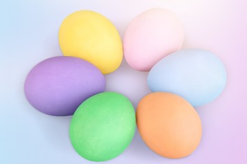 Colorful easter eggs on gradient background