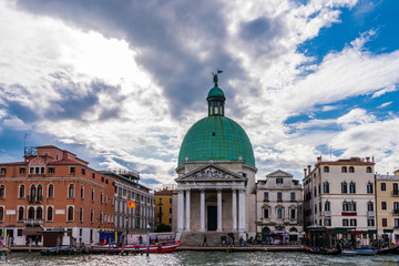 View of the Church of San Simeon Piccolo and ancient buildings in Venice on the Grand Canal. Italy.