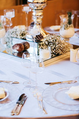 Christmas table setting. Holiday Decorations. Christmas background with an empty plate. decorations for the New Year's table. Concept Christmas, new year,food.