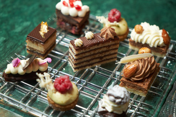 Dessert plate with assortment of sweets, piece of cake, cookies, biscuits