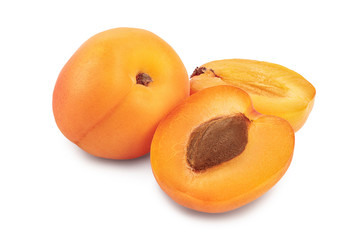 Apricot fruit with half isolated on white background macro