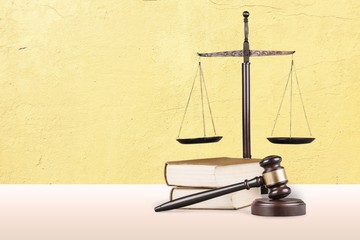 Justice Scales and books and wooden gavel on table. Justice concept
