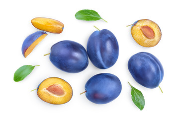 fresh plum and half with leaves isolated on white background. Top view. Flat lay
