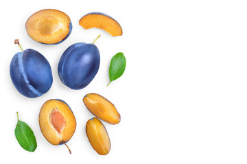 fresh plum and half with leaves isolated on white background. Top view. Flat lay