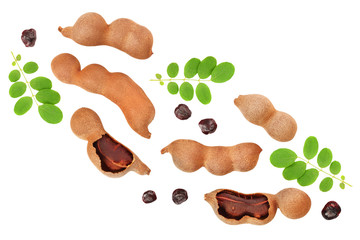 Tamarind fruit with leaf and seed isolated on white background, Top view. Flat lay