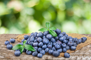 fresh blueberry with leaves on table isolated on white background closeup