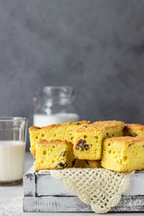Homemade cake loaf with raisins. Pound cake. Delicious breakfast with milk. 