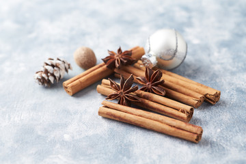 Star anise with cinnamon. Christmas spices on rustic wooden background. Copy space. 