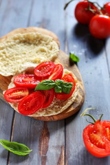 puccia bread with tomatoes and fresh basil