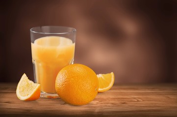 Orange Juice in glass on background.