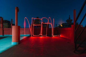 Light painting long exposure image with letters NEPAL.