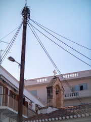 powerlines above an old church steeple