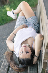 Portrait of a young entrepreneur influencer at the park in Bergamo, Italy