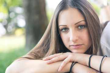 Portrait of a young entrepreneur influencer at the park in Bergamo, Italy