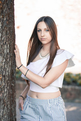 Portrait of a young entrepreneur influencer at the park in Bergamo, Italy