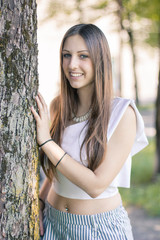 Portrait of a young entrepreneur influencer at the park in Bergamo, Italy
