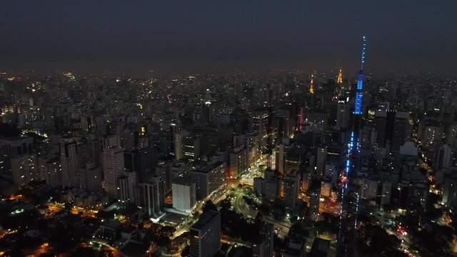 Nightlife view of illuminated cityscape in Sao Paulo, Brazil. Illuminated cityscape in the nightlife. Illuminated Sao Paulo cityscape. Nightlife scene.