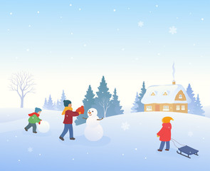 Snow covered winter village with kids making a snowman