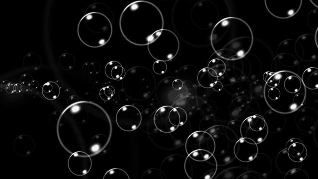 Cloud of bubbles flying over screen as intro, opening, transition, background, overlay, logo or title revealer effect. Artistic VFX animation with alpha channel transparency.