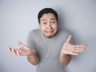 Asian Man Shrug Shoulder I don't Know Gesture