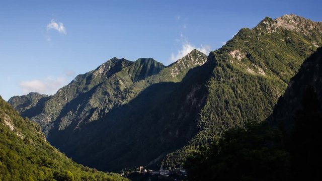 Little city under montains and clouds, Timelapse, Alagna Valsesia, Italy, Europe