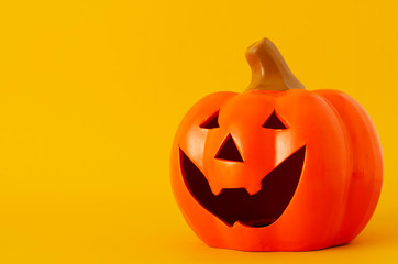 Halloween pumpkin objects on yellow backgrounds