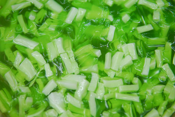 Cube coconut jelly in green syrup for eat with ice, Thai dessert.