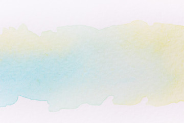 Abstract handmade watercolor.It is wet texture background with paint brushes on the white paper. Picture for design art work.