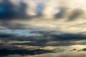 colorful dramatic sky with cloud at sunset.