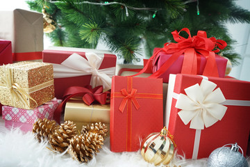 Fototapeta na wymiar Christmas gifts and decorations on white background