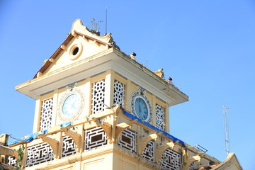 Fototapeta na wymiar Clock Tower of Binh Tay Market in Ho Chi Minh City, Vietnam