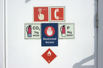 Various warning signs posted
