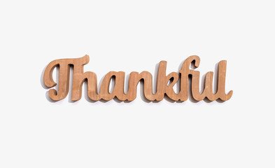 Thankful wooden text from above - overhead view