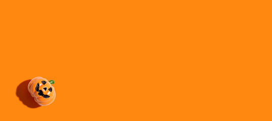 Helloween miniature pumpkin - overhead view flat lay