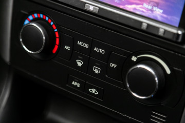 Car, vehicle interior with visible climate controls, adjustment of the fragment of instrument panel..