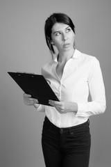 Portrait of young beautiful businesswoman shot in black and white